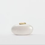 Stellinaa?¡é Clutch a?? Playful Charm with Timeless Elegance